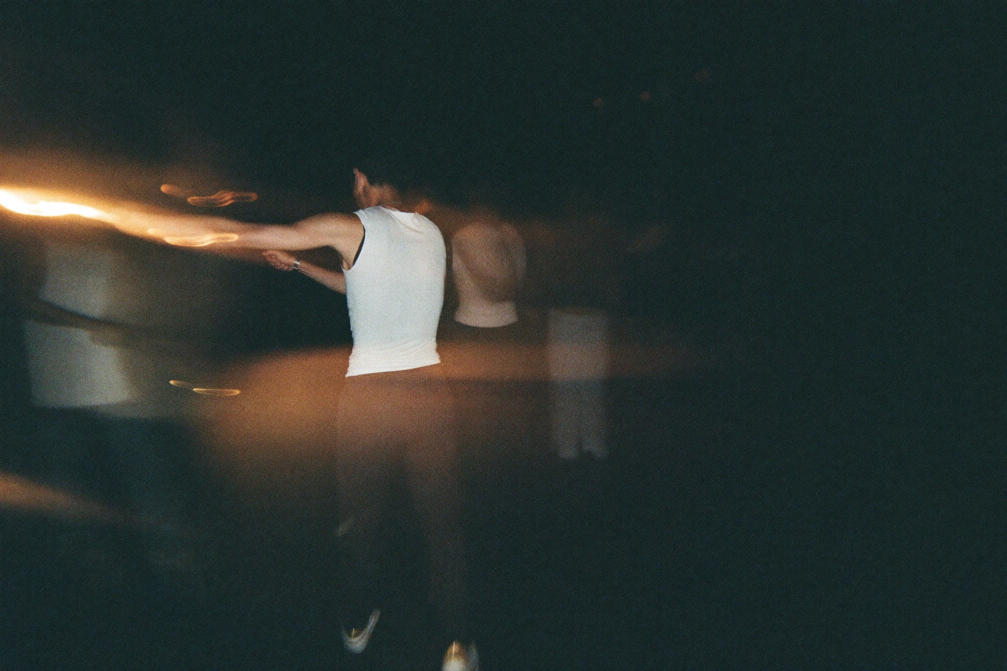Afterparty dance flash blur. Atmosphere only — not a guest frame.